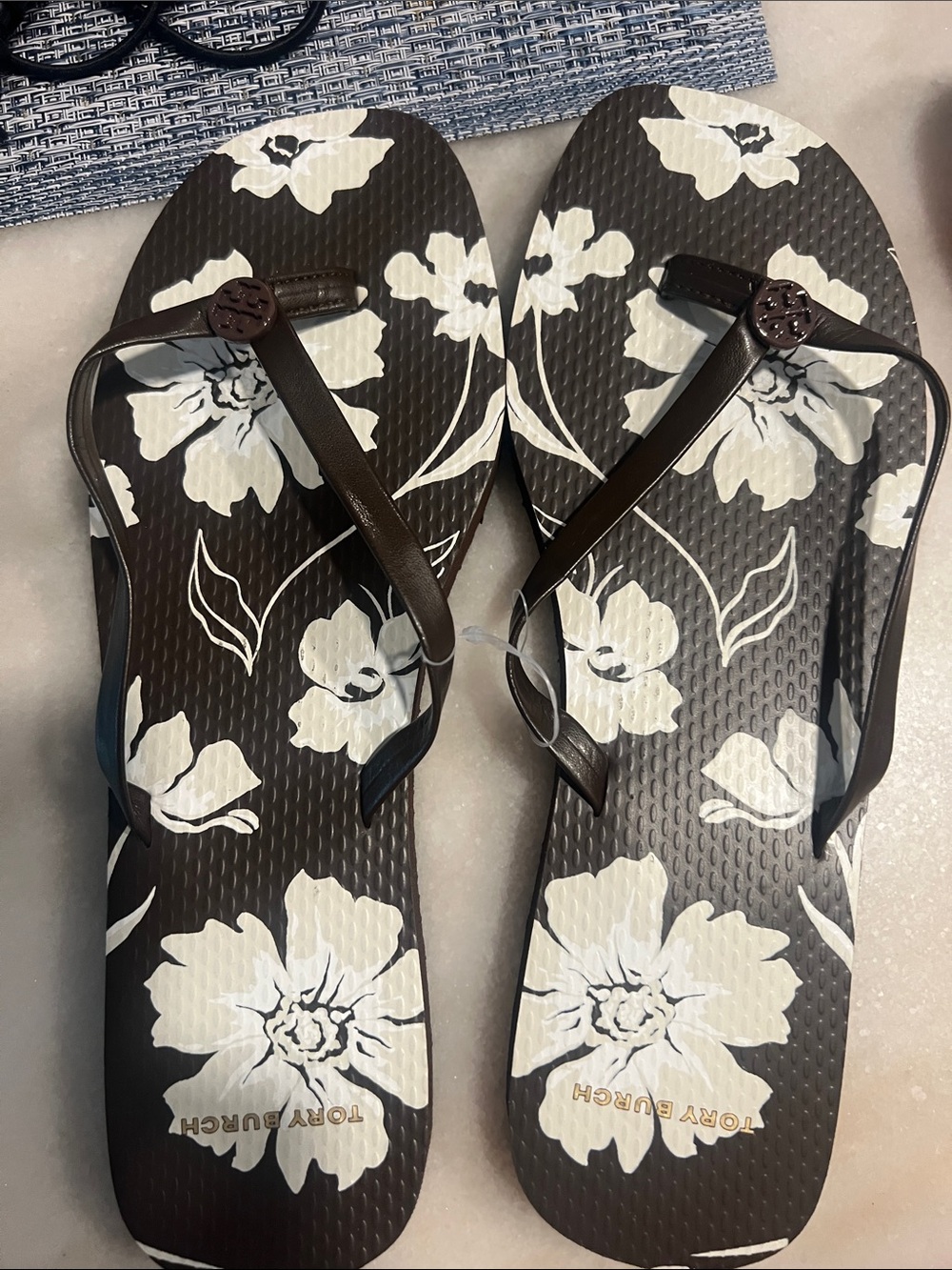 Tory Burch Brown Flip Flop Sandals with White Floral Print